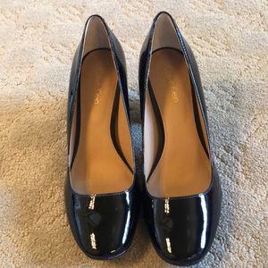 Calvin Klein black patent pumps